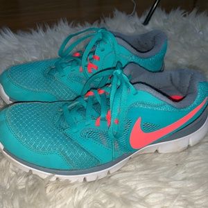 Blue and Pink Nike Athletic Shoes